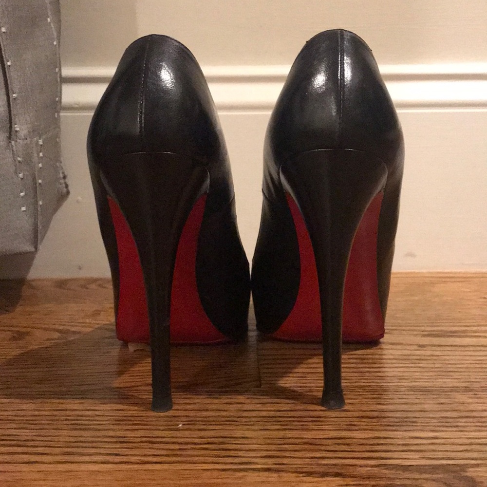 Black louboutin pumps